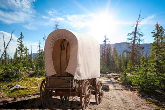 Covered wagon used by pioneers traveling across America.