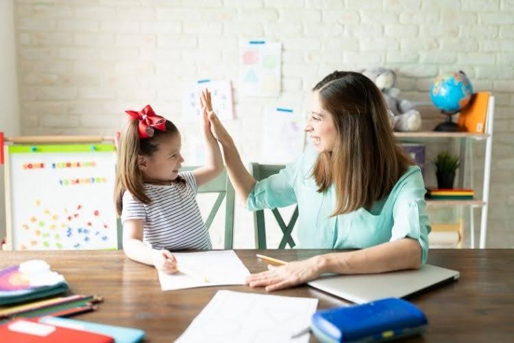 Mother homeschooling her daughter in New Jersey at home